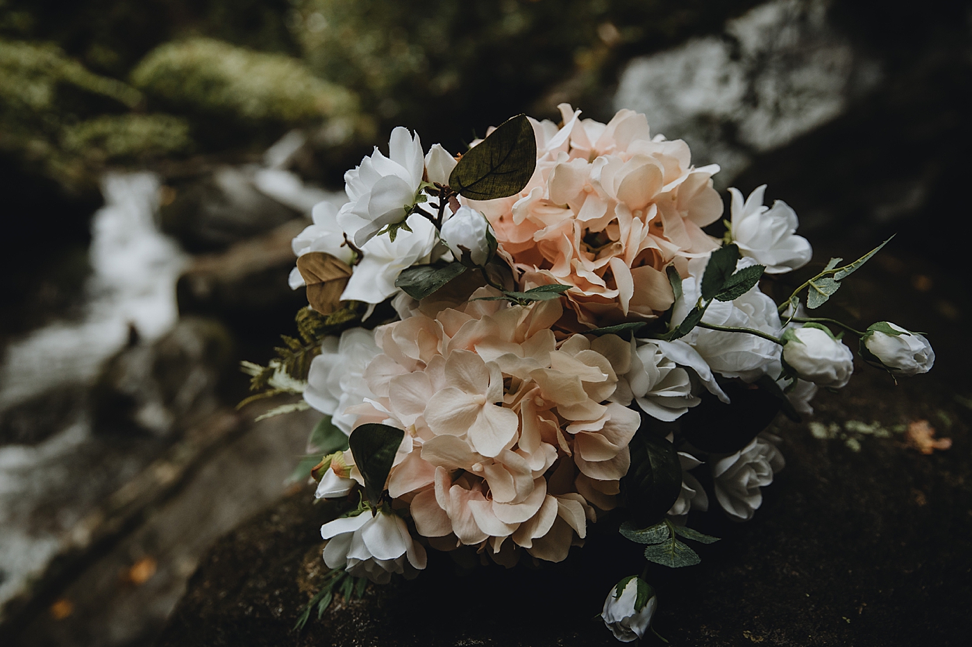 Detail shot of bouquet in the forest Catawba Falls Asheville, NC Elopement Photography captured by Maggie Alvarez Photography