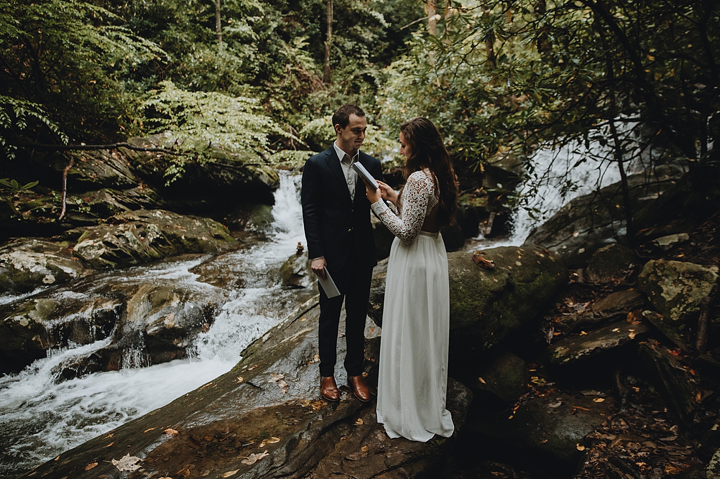 Bride delivering vows in forest Catawba Falls Asheville, NC Elopement Photography captured by Maggie Alvarez Photography