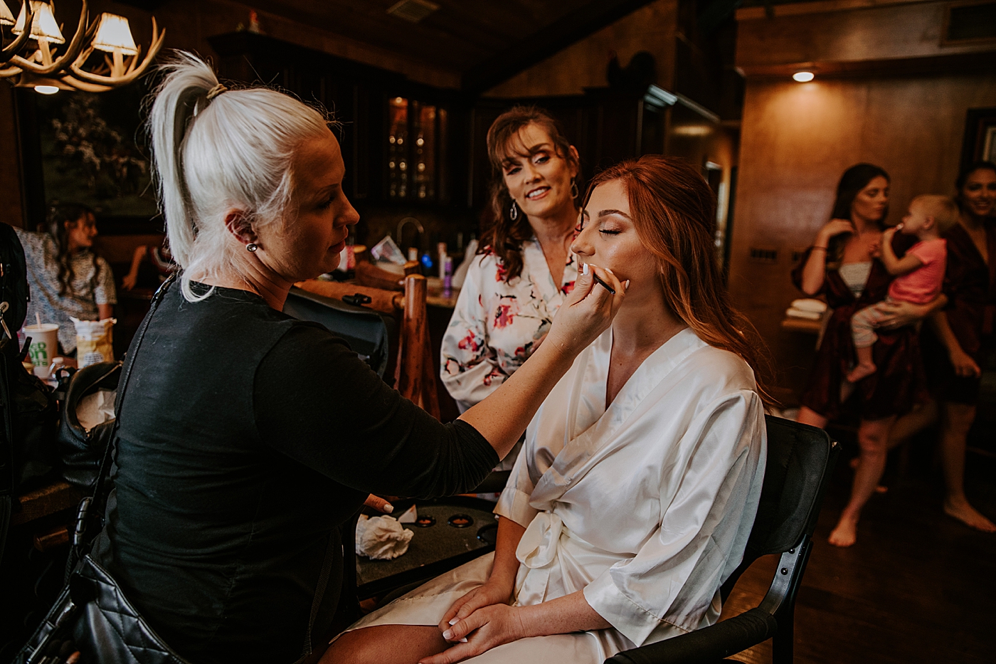 Bride getting her makeup on BMR Stables Wedding Photography captured by South Florida Wedding Photographer Maggie Alvarez Photography