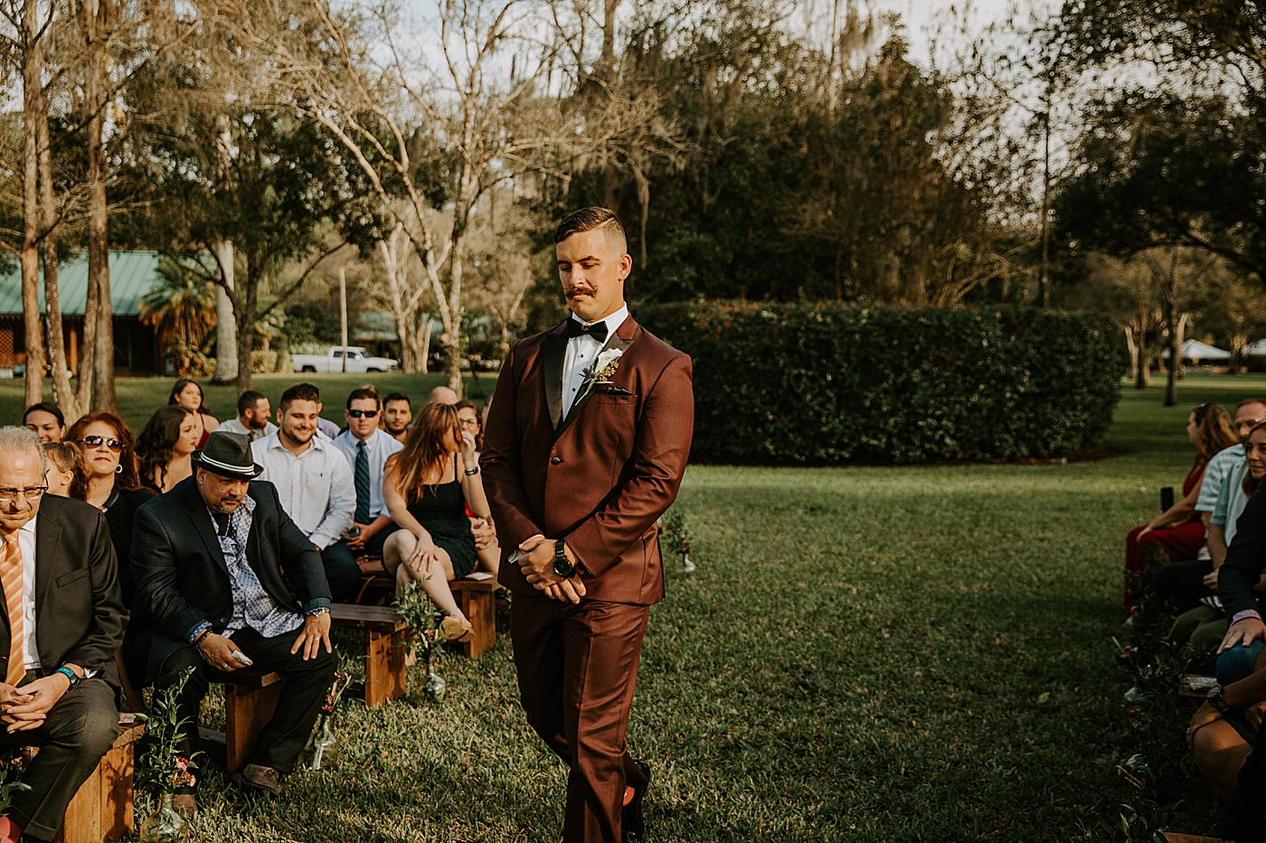 Groom entering ceremony BMR Stables Wedding Photography captured by South Florida Wedding Photographer Maggie Alvarez Photography