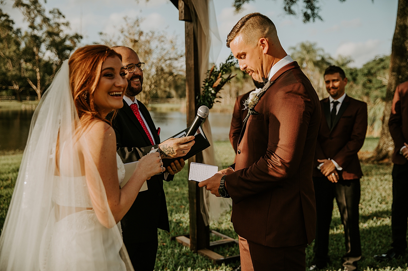 Groom giving vows Bride entering ceremony with father BMR Stables Wedding Photography captured by South Florida Wedding Photographer Maggie Alvarez Photography