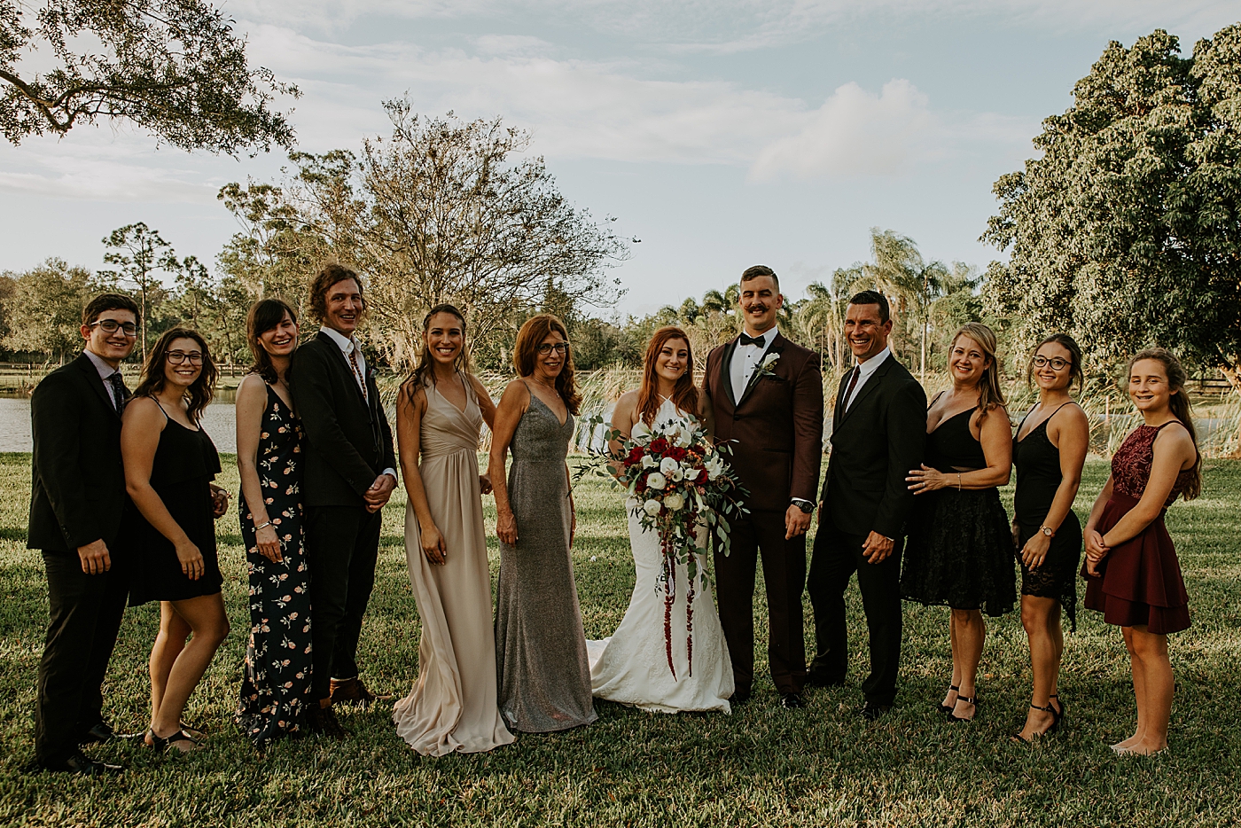 Family and friends portrait Bride entering ceremony with father BMR Stables Wedding Photography captured by South Florida Wedding Photographer Maggie Alvarez Photography