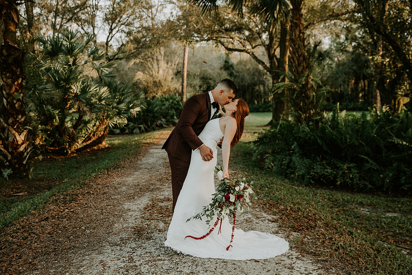 Bride and Groom dipping and kissing Bride entering ceremony with father BMR Stables Wedding Photography captured by South Florida Wedding Photographer Maggie Alvarez Photography