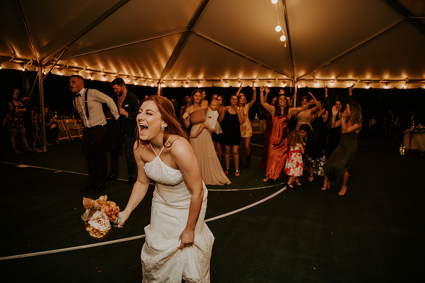 Bouquet toss Bride entering ceremony with father BMR Stables Wedding Photography captured by South Florida Wedding Photographer Maggie Alvarez Photography