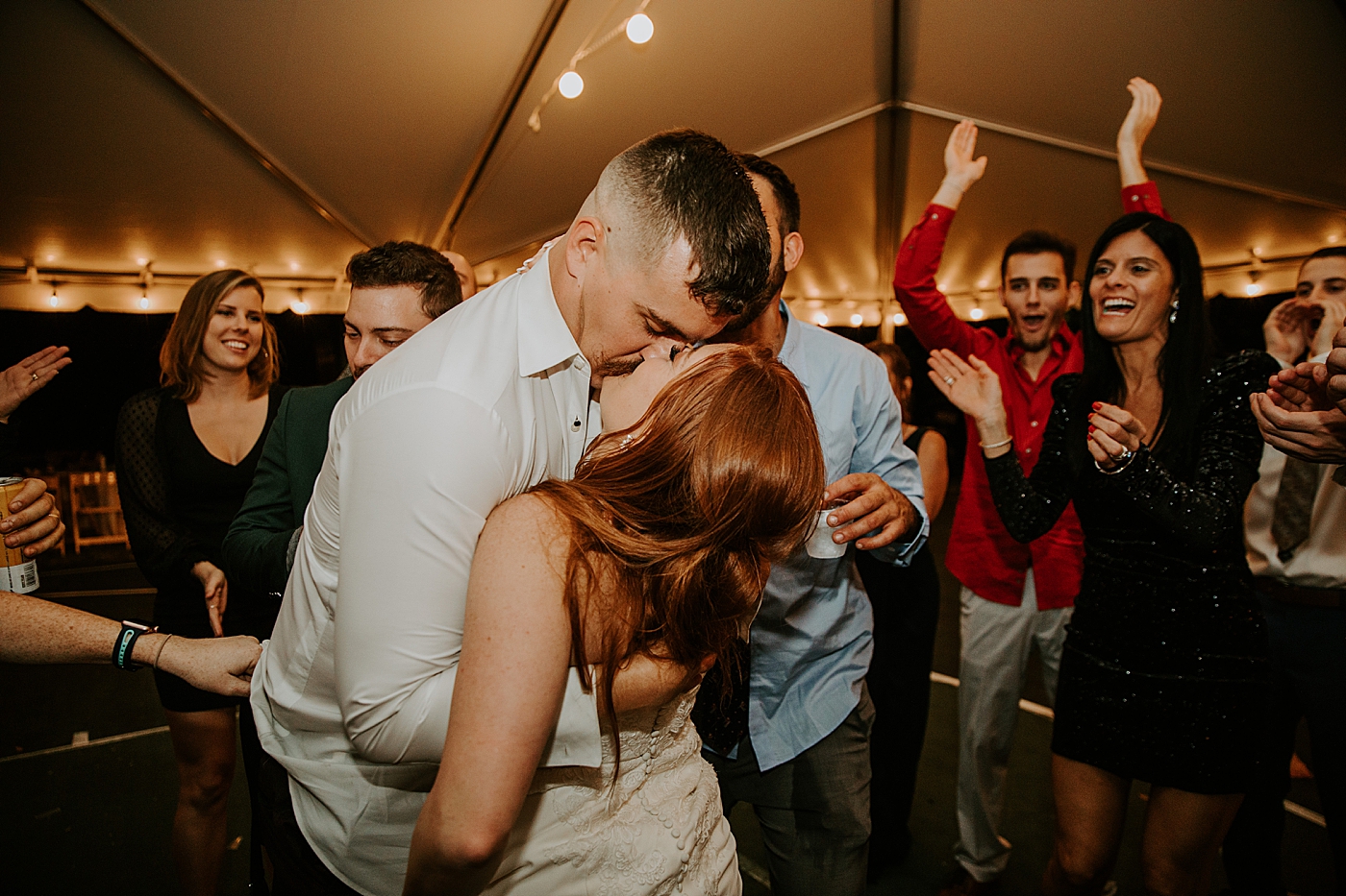 Bride and Groom kissing on the dance floor Bride entering ceremony with father BMR Stables Wedding Photography captured by South Florida Wedding Photographer Maggie Alvarez Photography