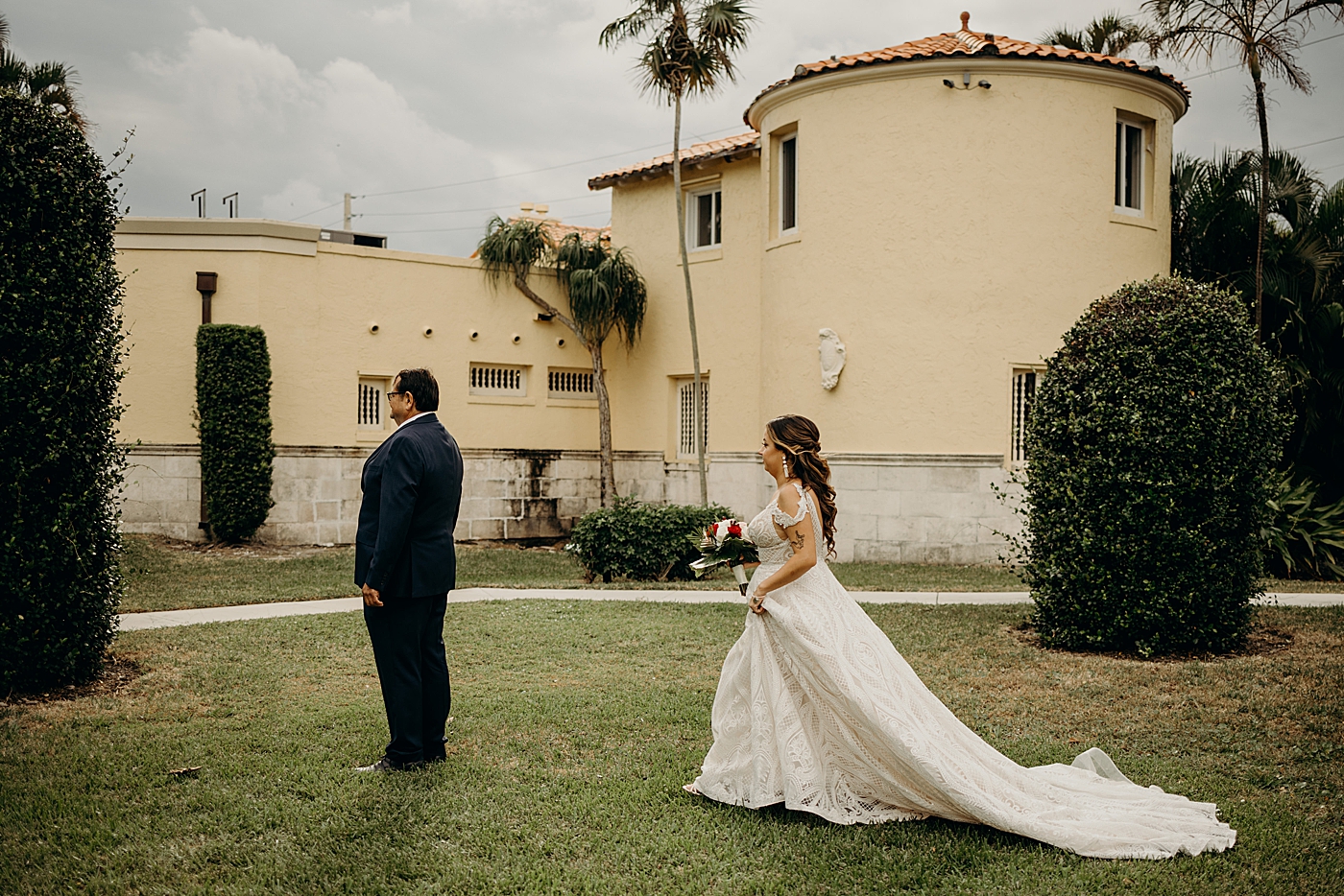 Father first look with Bride approaching Father with his back turned Benvenuto Restaurant Wedding Photography captured by South Florida Wedding Photographer Maggie Alvarez Photography