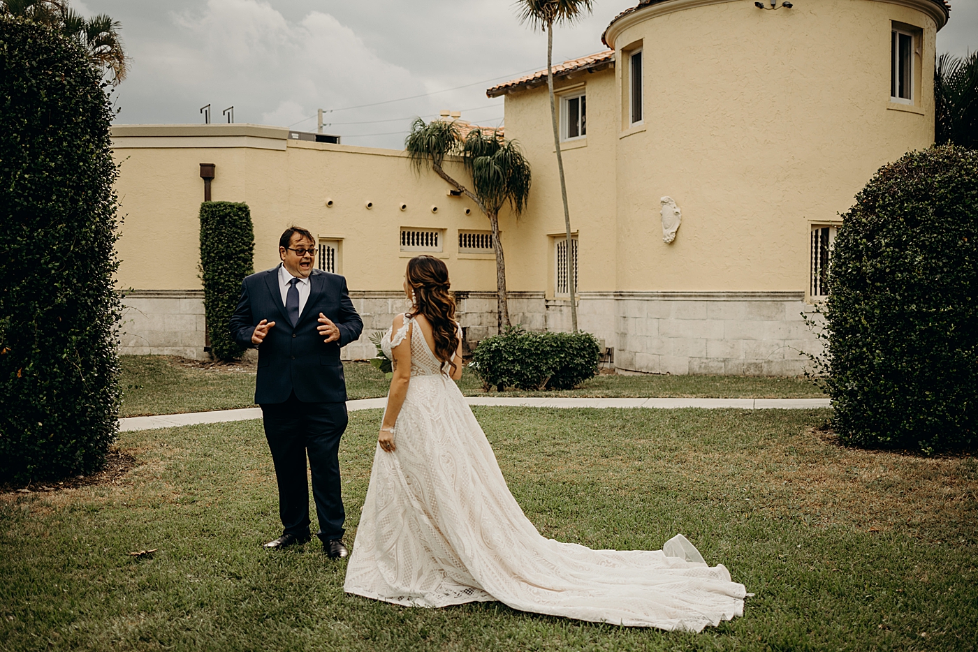 Father's first look reaction to seeing Bride in dress Benvenuto Restaurant Wedding Photography captured by South Florida Wedding Photographer Maggie Alvarez Photography