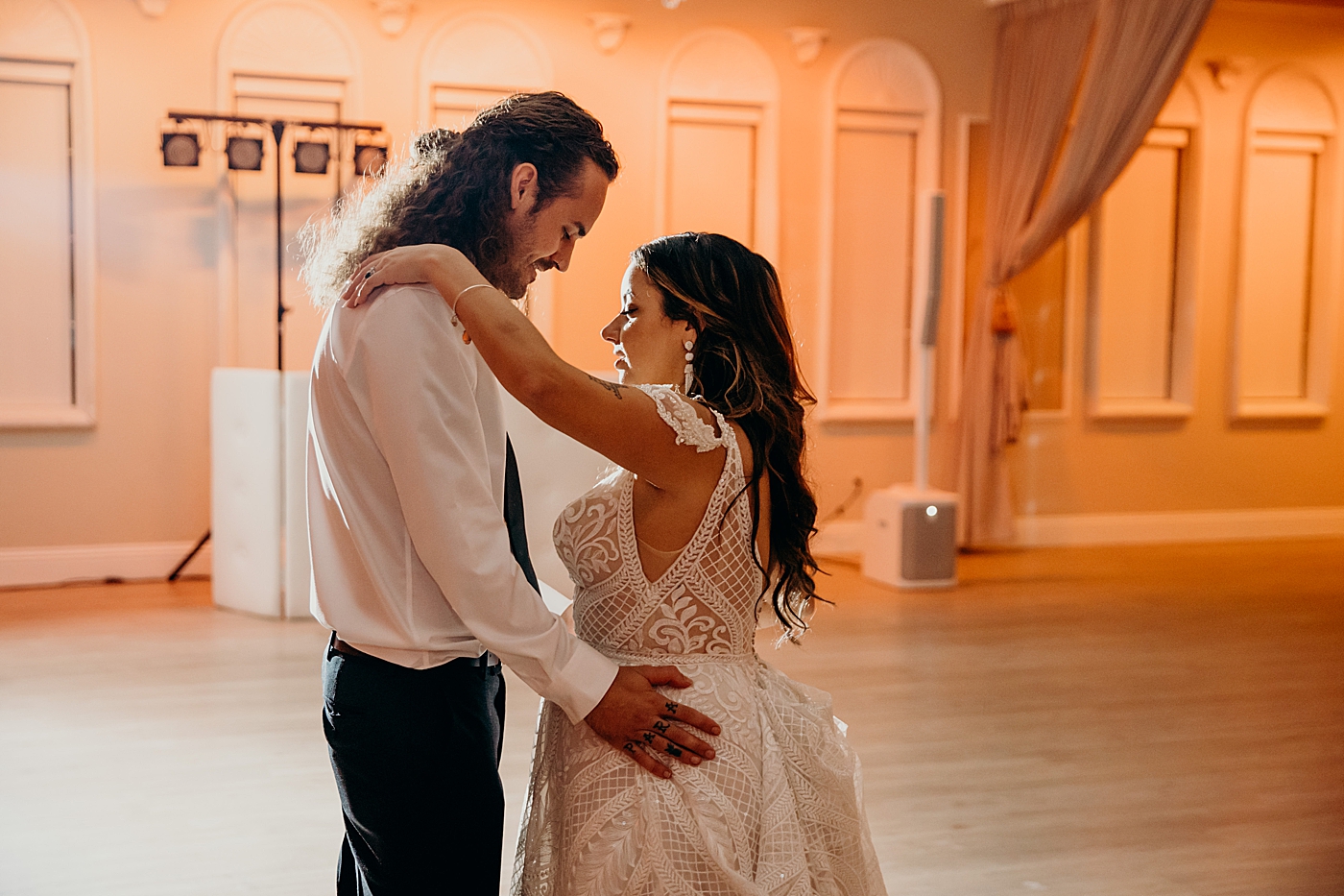 Bride and Groom dancing together Benvenuto Restaurant Wedding Photography captured by South Florida Wedding Photographer Maggie Alvarez Photography