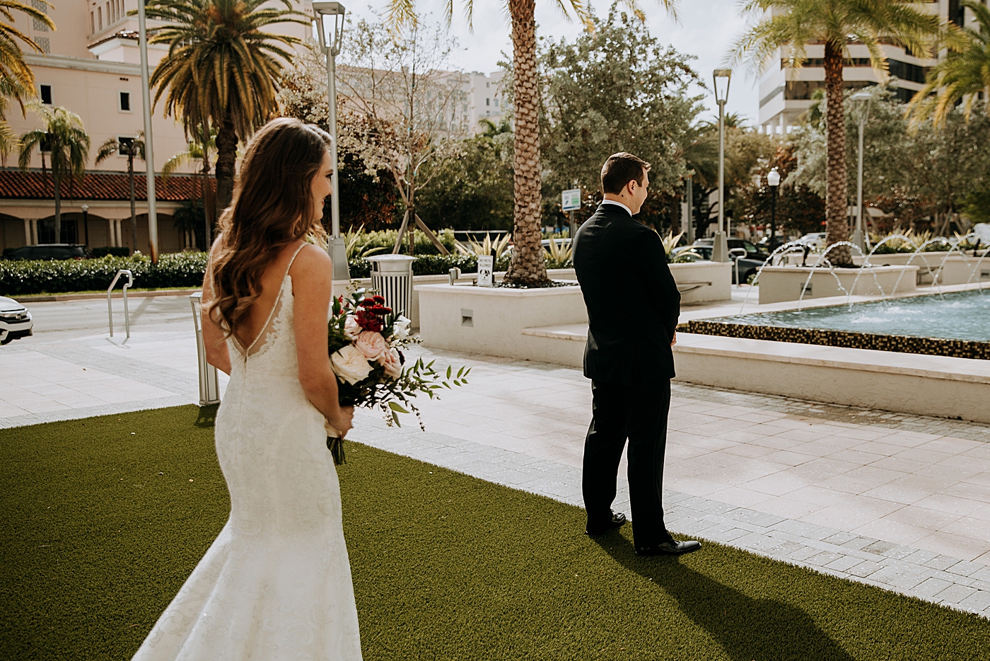 First Look Bride approaching Groom Coral Gables Country Club Wedding Photography captured by South Florida Wedding Photographer Maggie Alvarez Photography