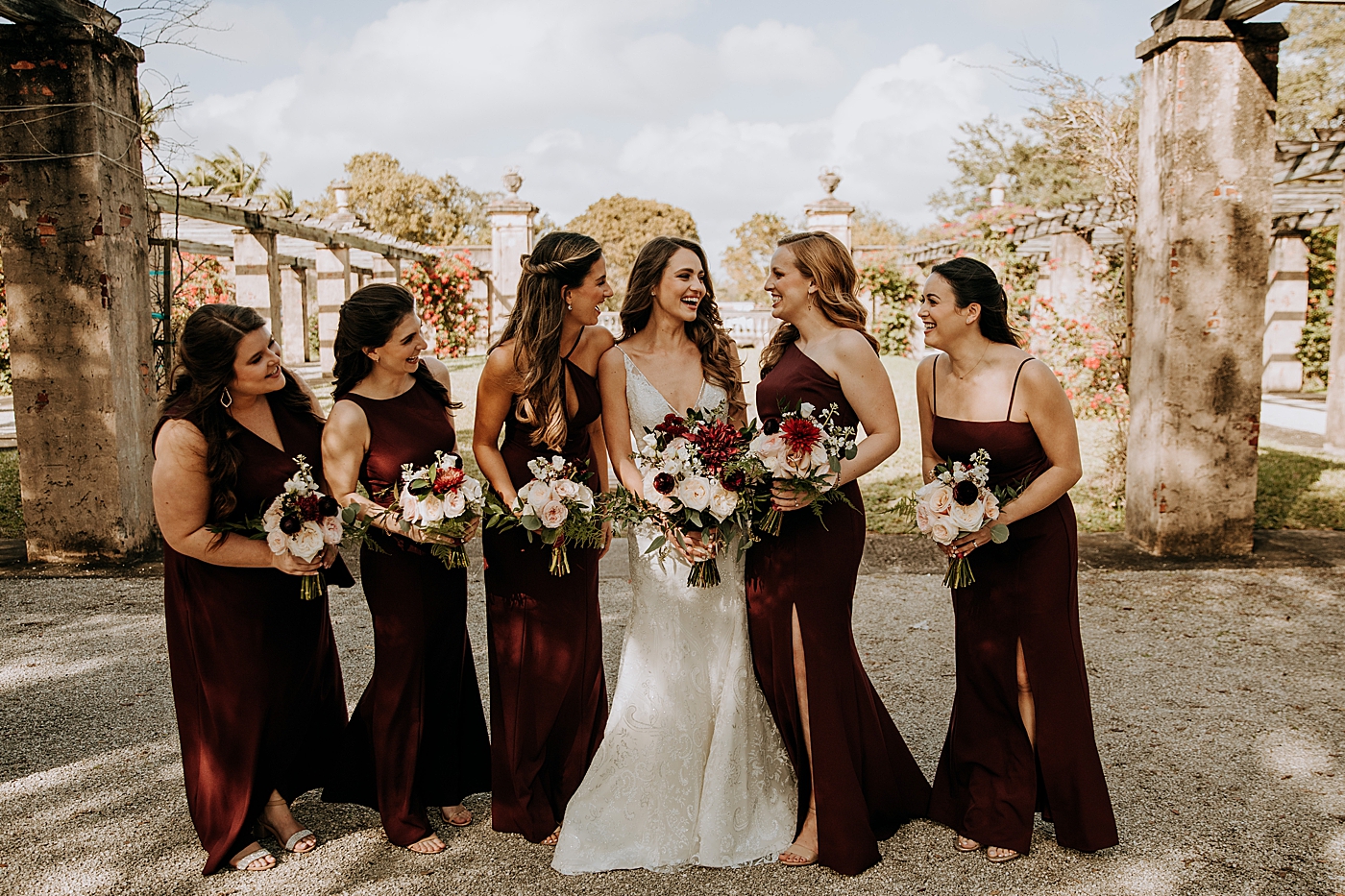 Bride and Bridesmaids portrait with bouquets Coral Gables Country Club Wedding Photography captured by South Florida Wedding Photographer Maggie Alvarez Photography