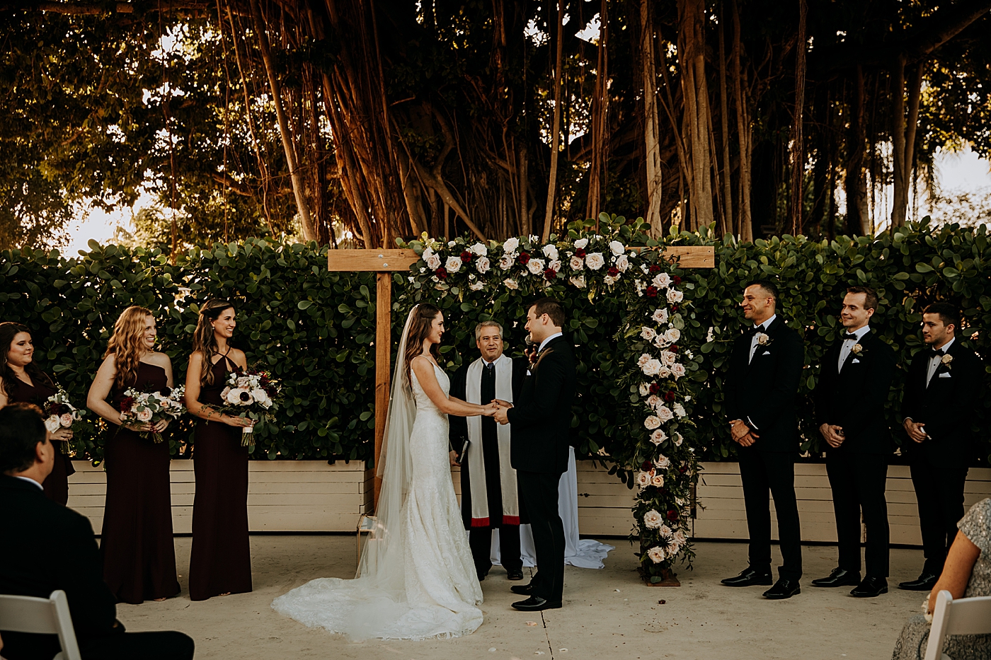 Bride and Groom exchanging vows Coral Gables Country Club Wedding Photography captured by South Florida Wedding Photographer Maggie Alvarez Photography