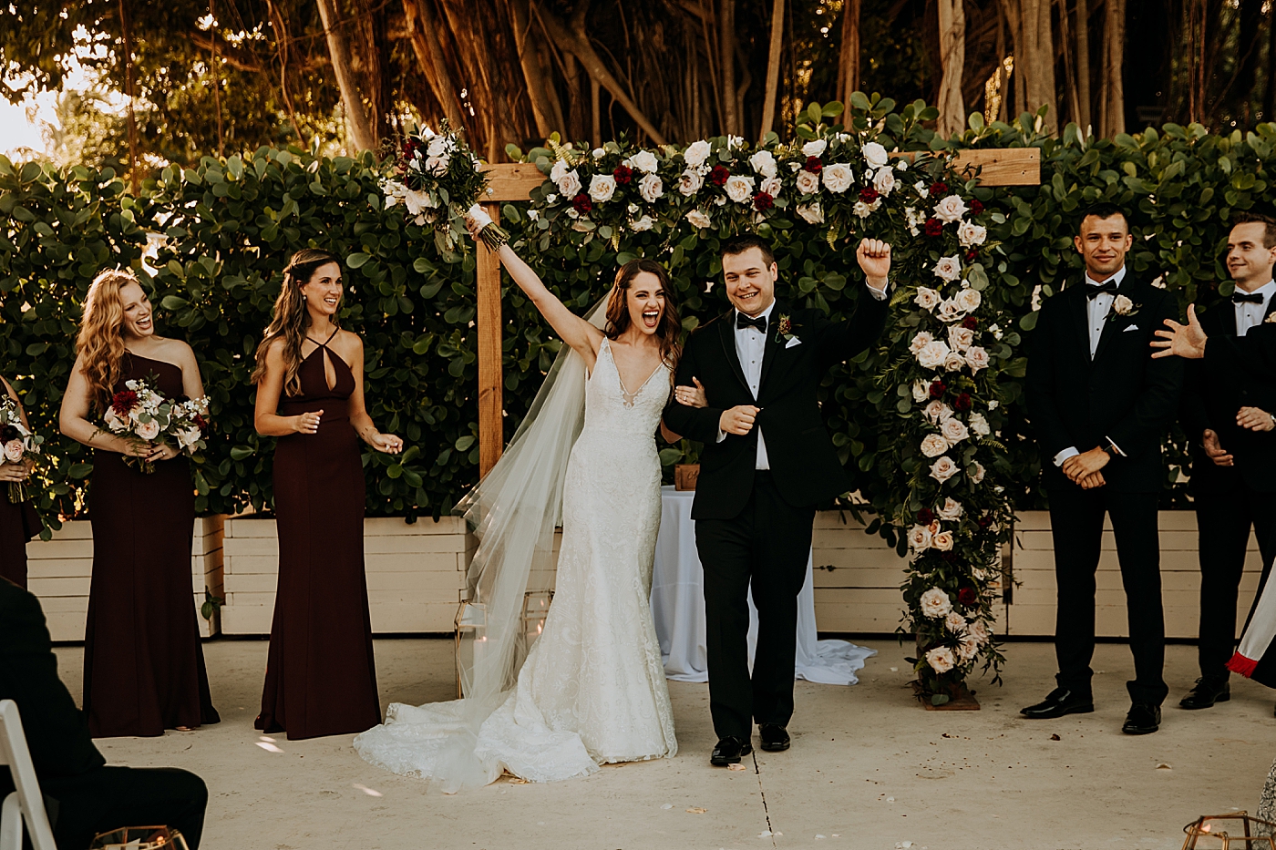 Just Married Triumphant stance Coral Gables Country Club Wedding Photography captured by South Florida Wedding Photographer Maggie Alvarez Photography