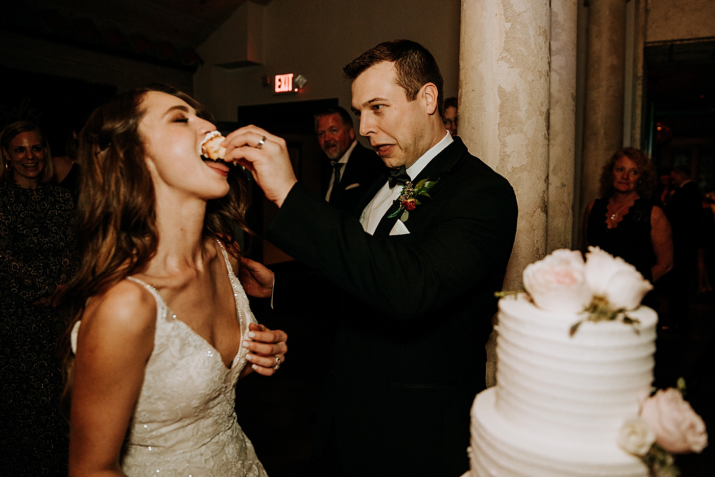 Groom feeding cake to Bride Coral Gables Country Club Wedding Photography captured by South Florida Wedding Photographer Maggie Alvarez Photography