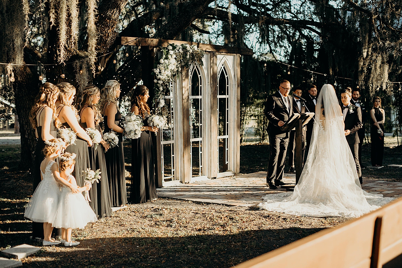 Ceremony wide shot of wedding party and brides Ever After Farms Wedding Photography captured by South Florida Wedding Photographer Maggie Alvarez Photography