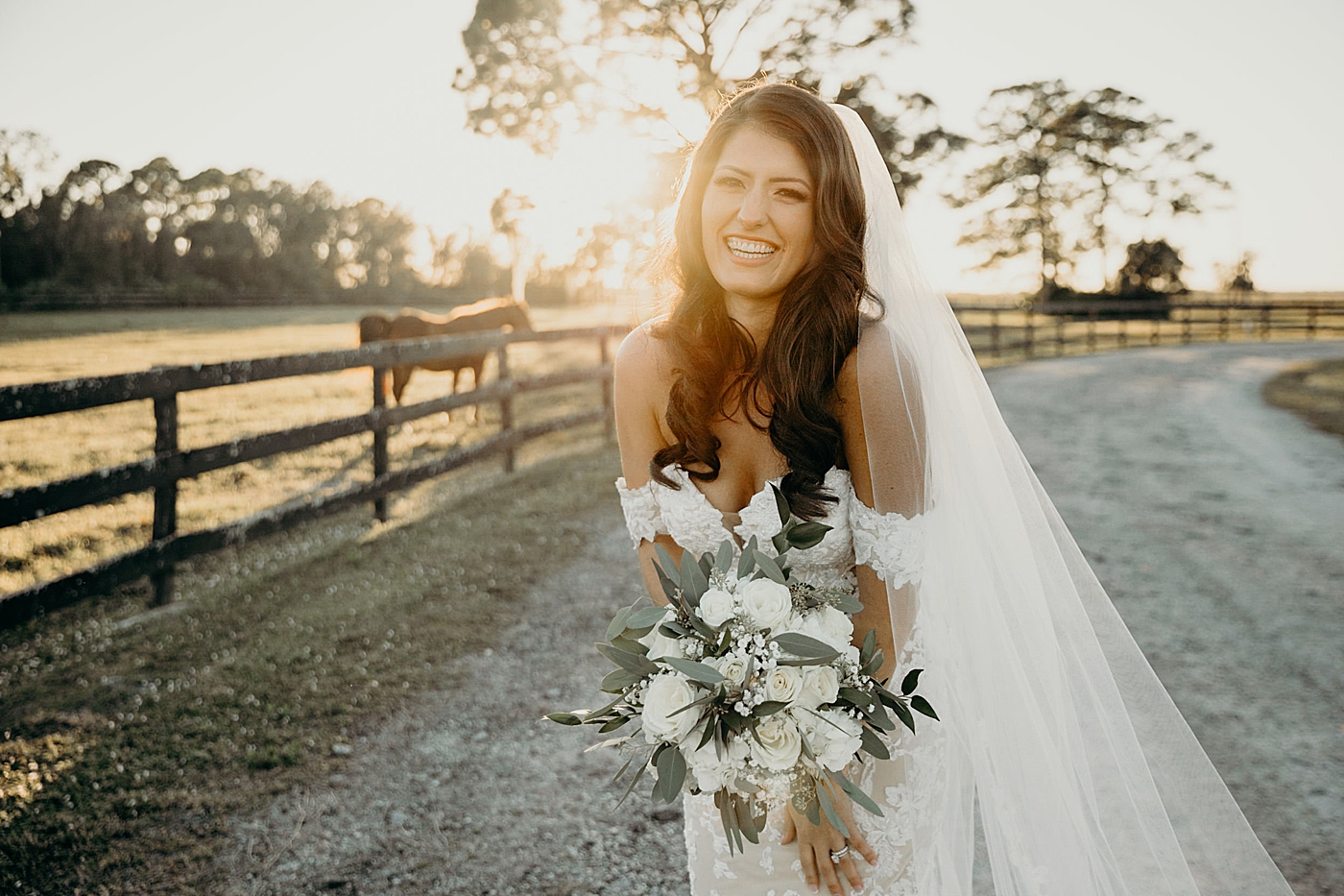 Portrait of Bride with horse in the background Ever After Farms Wedding Photography captured by South Florida Wedding Photographer Maggie Alvarez Photography