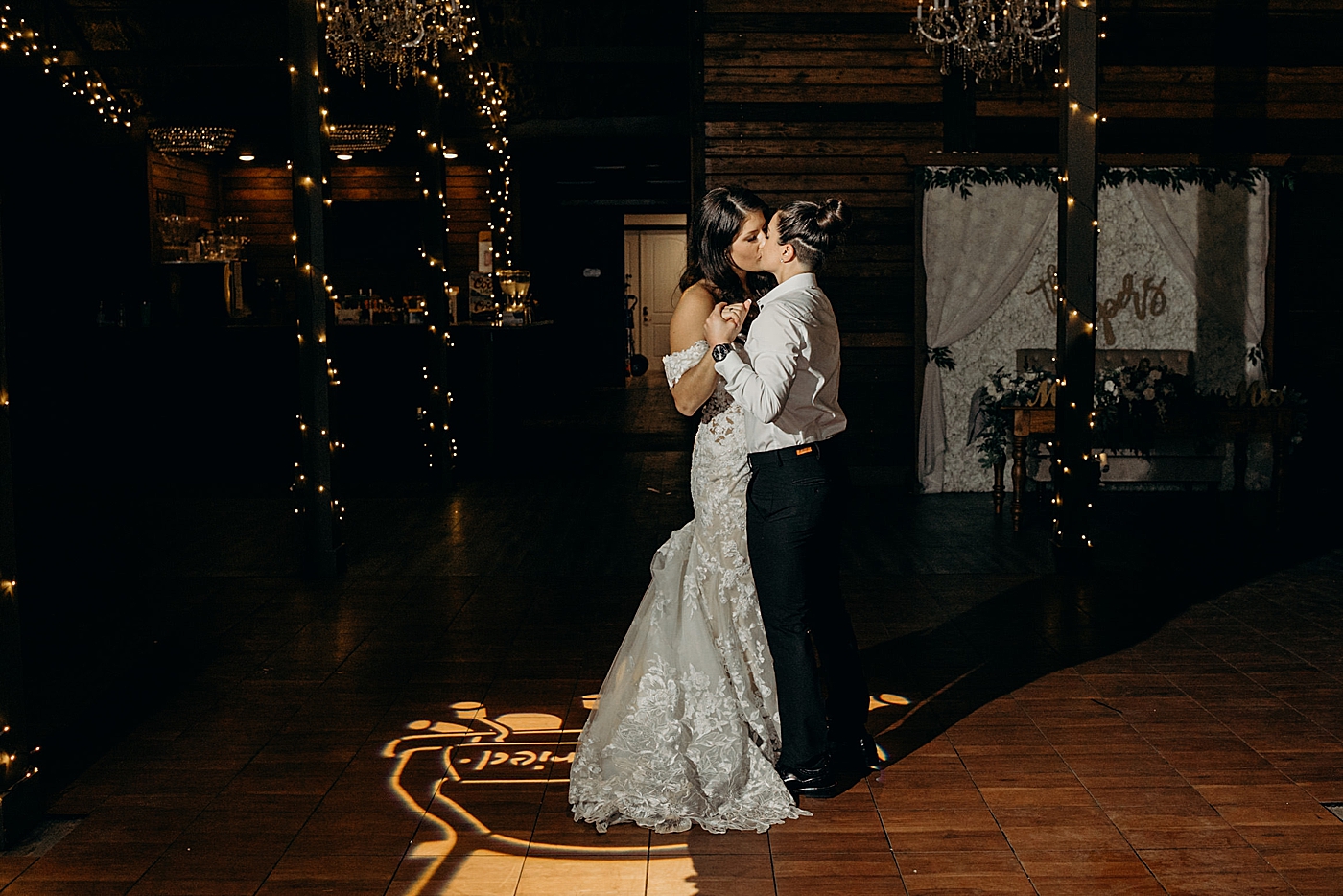 First dance with couple kissing Ever After Farms Wedding Photography captured by South Florida Wedding Photographer Maggie Alvarez Photography