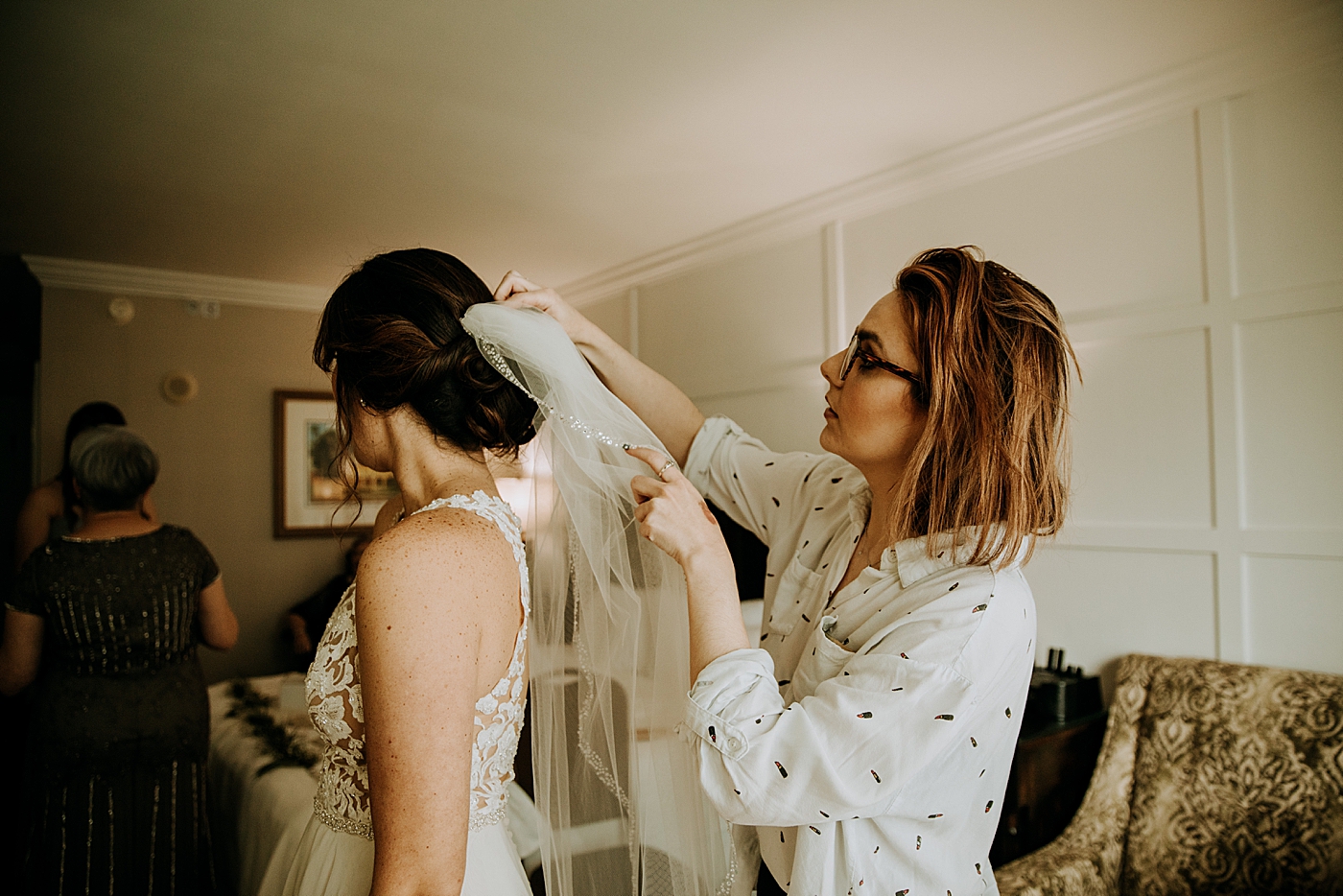 Bride getting the veil on Getting Ready Historic Stranahan House Wedding Photography captured by South Florida Wedding Photographer Maggie Alvarez Photography