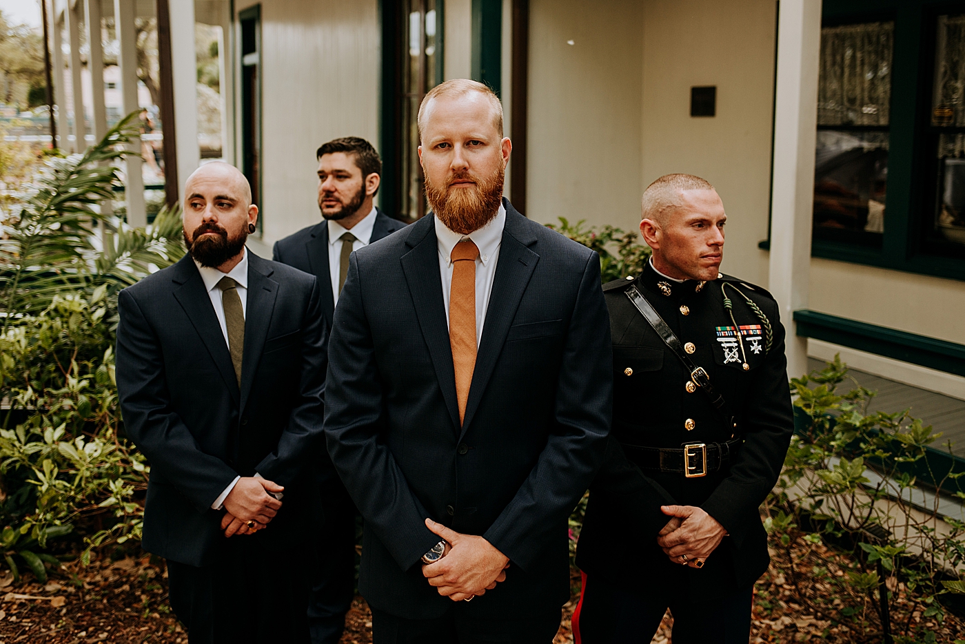 Groom and Groomsmen posing Historic Stranahan House Wedding Photography captured by South Florida Wedding Photographer Maggie Alvarez Photography