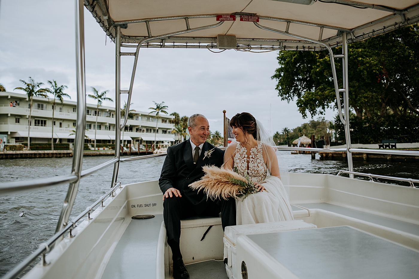 Father and Bride on the boat Historic Stranahan House Wedding Photography captured by South Florida Wedding Photographer Maggie Alvarez Photography