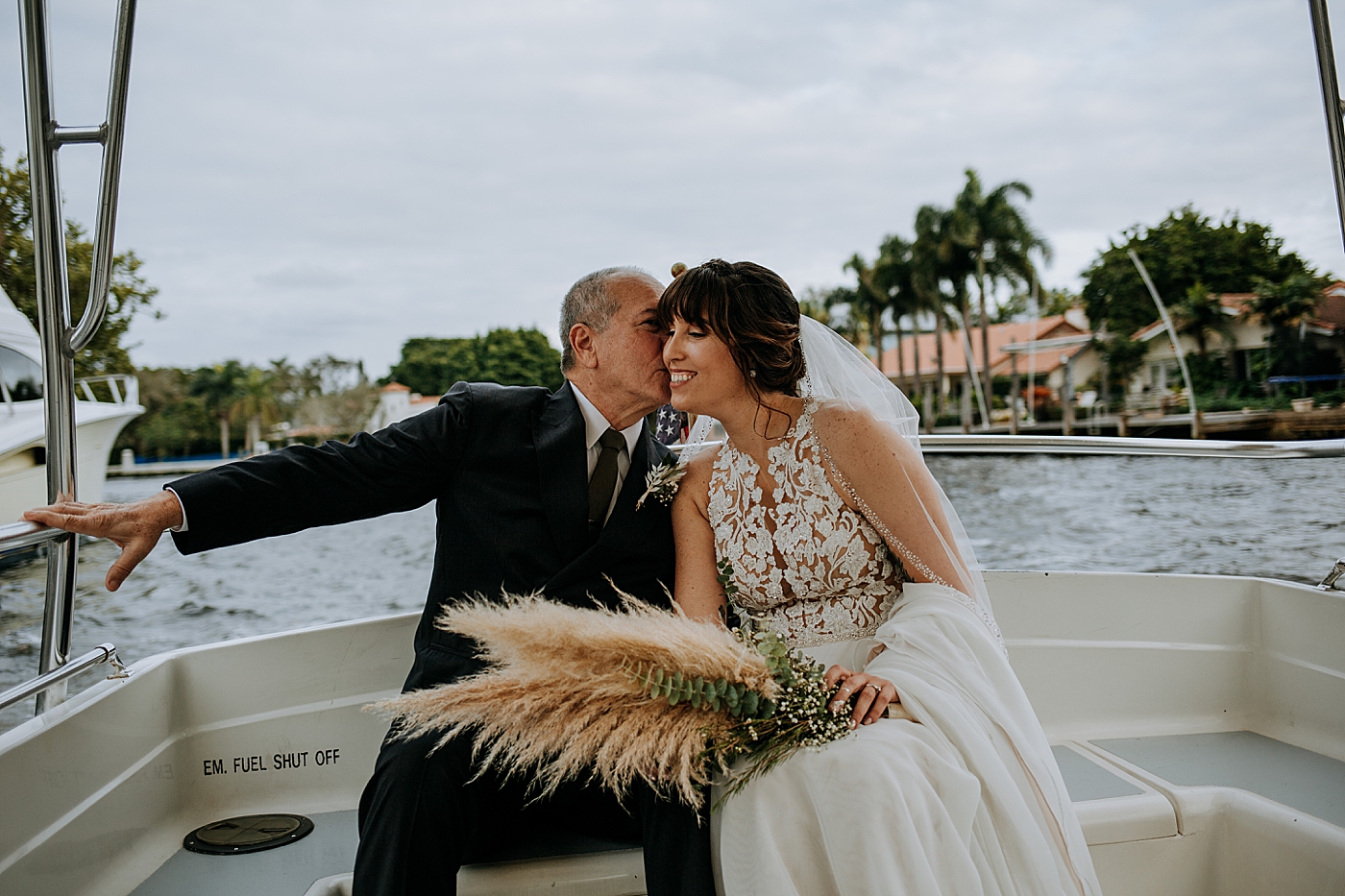 Bride and Father on boat before ceremony Historic Stranahan House Wedding Photography captured by South Florida Wedding Photographer Maggie Alvarez Photography