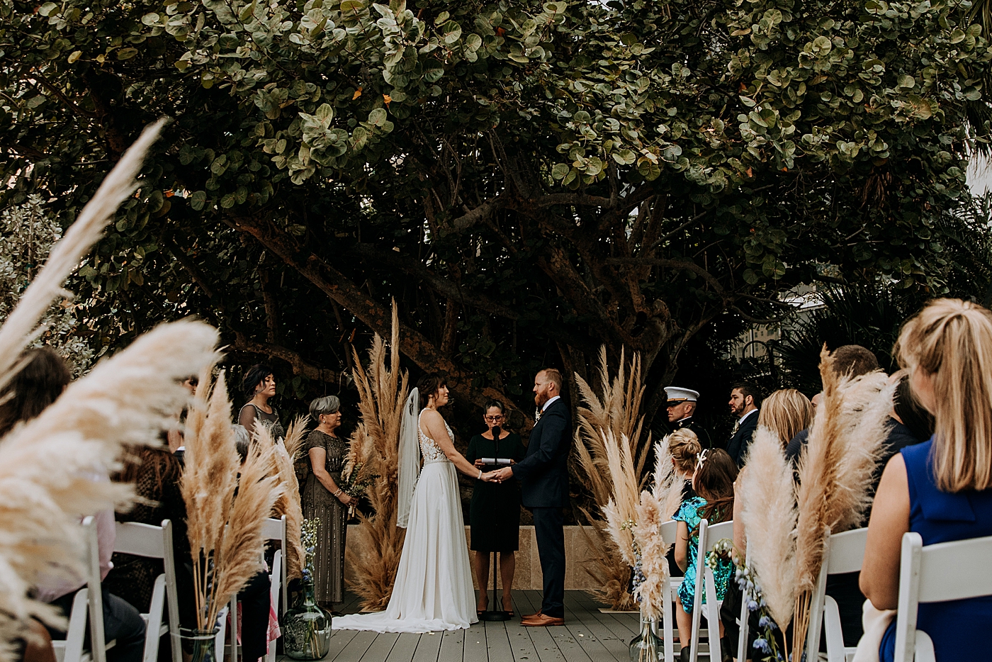 Bride and Groom exchanging vows at Ceremony Historic Stranahan House Wedding Photography captured by South Florida Wedding Photographer Maggie Alvarez Photography