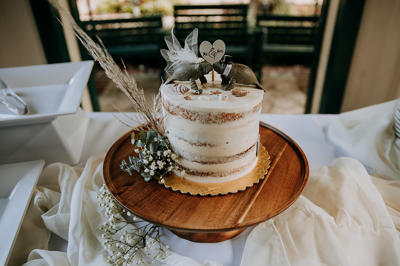 Reception detail shot of cake Historic Stranahan House Wedding Photography captured by South Florida Wedding Photographer Maggie Alvarez Photography