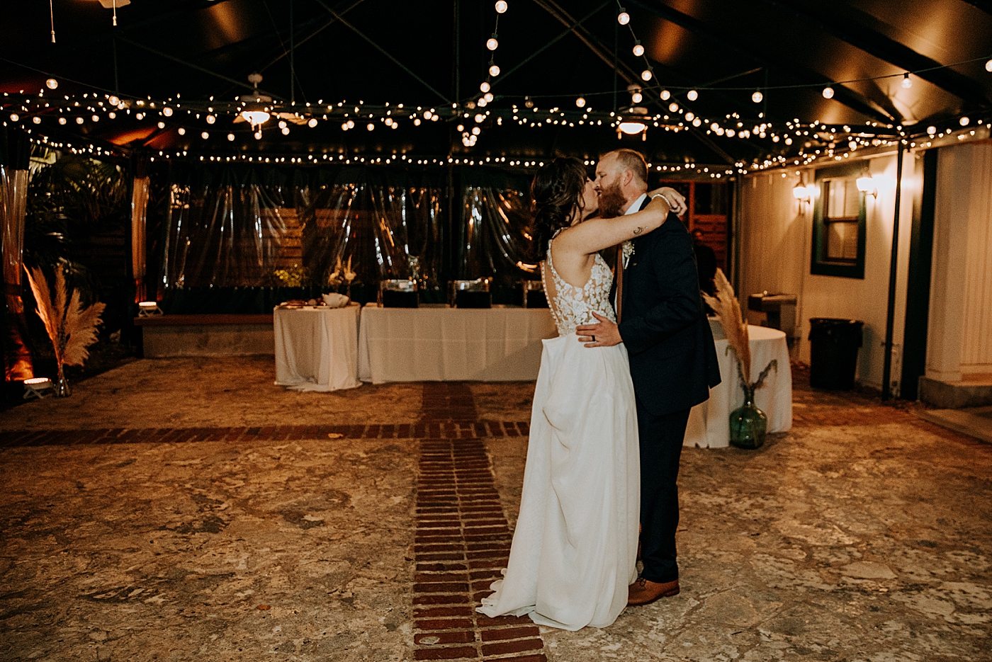 Bride and Groom kissing during first dance Historic Stranahan House Wedding Photography captured by South Florida Wedding Photographer Maggie Alvarez Photography