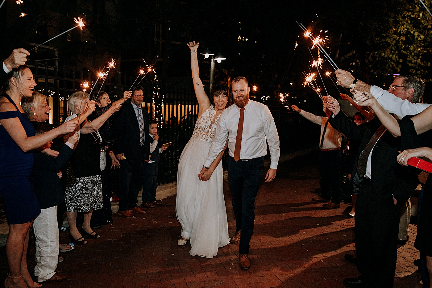 Bride and Groom exiting with sparklers Historic Stranahan House Wedding Photography captured by South Florida Wedding Photographer Maggie Alvarez Photography