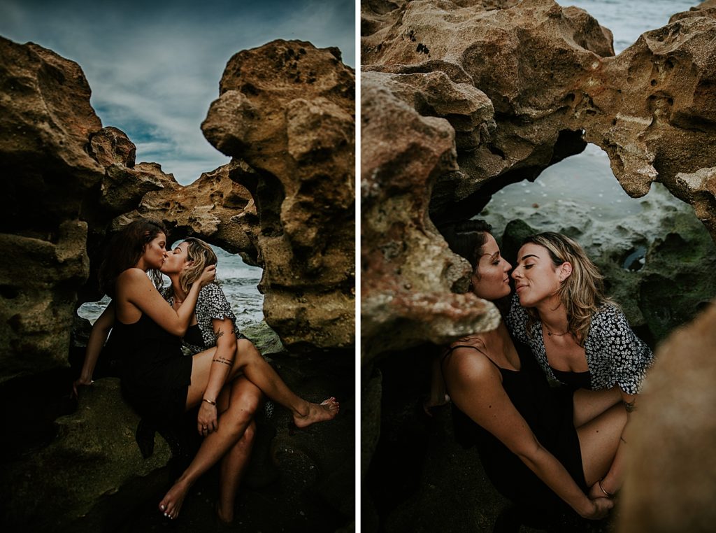 Couple kissing in beach rock cove South Florida LGBTQ+ Engagement Photography captured by Maggie Alvarez Photography