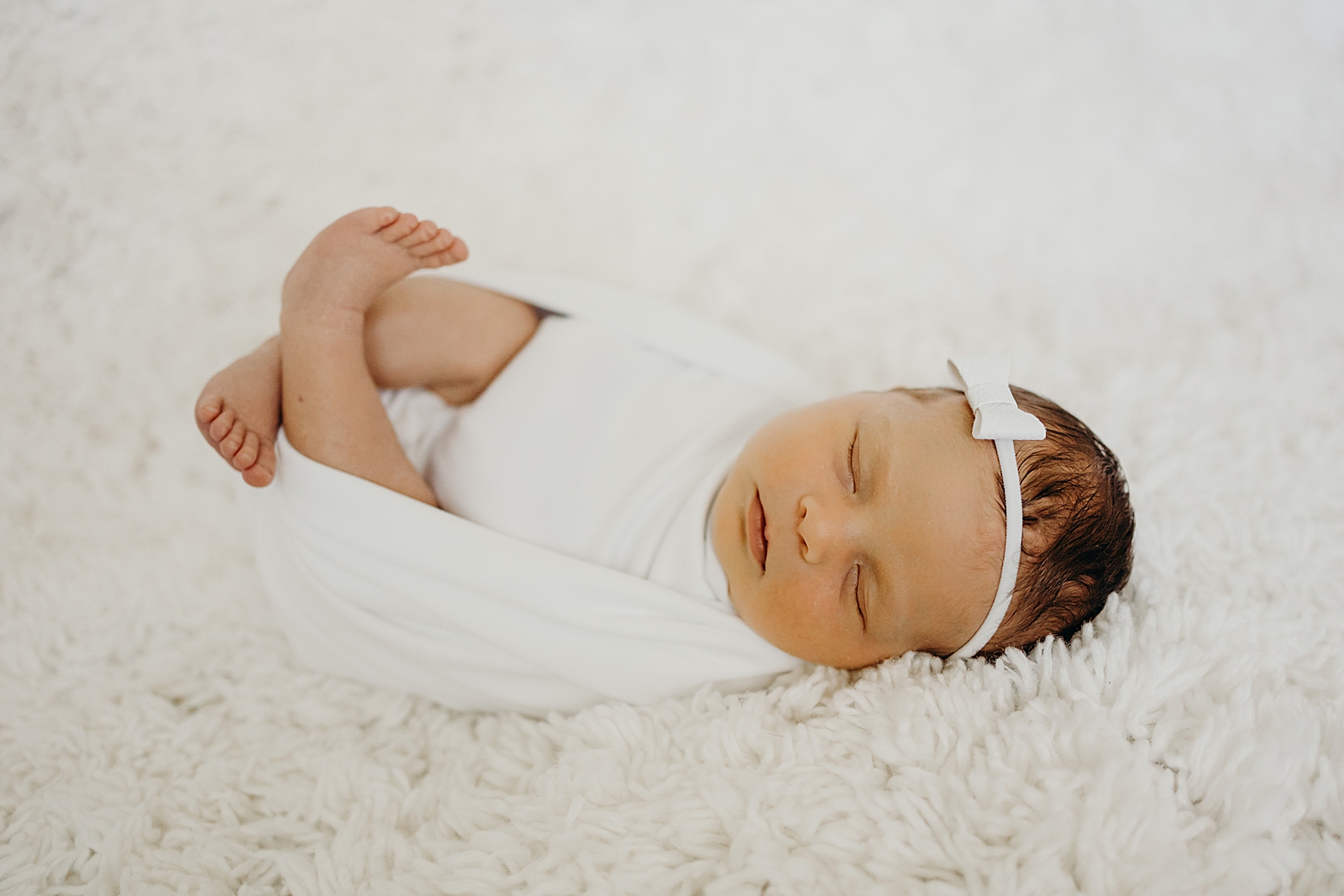 Baby sleeping peacefully and comfortably South Florida Newborn Photography Photography captured by South Florida Family Photographer Maggie Alvarez Photography
