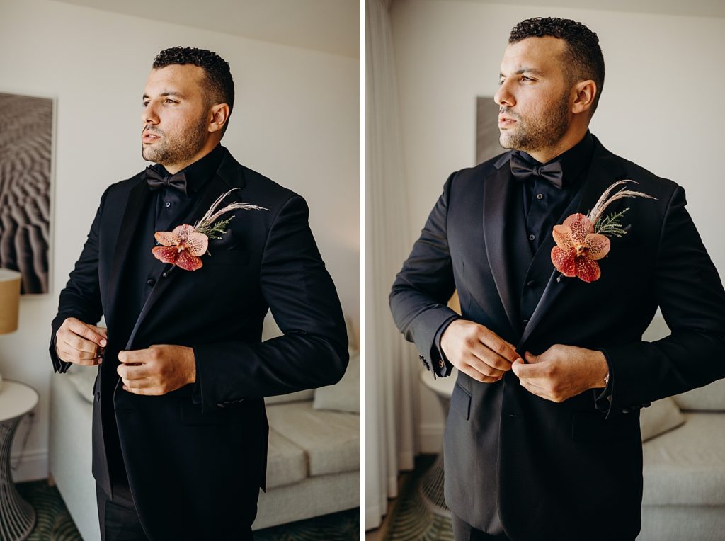 Groom getting ready buttoning his jacket