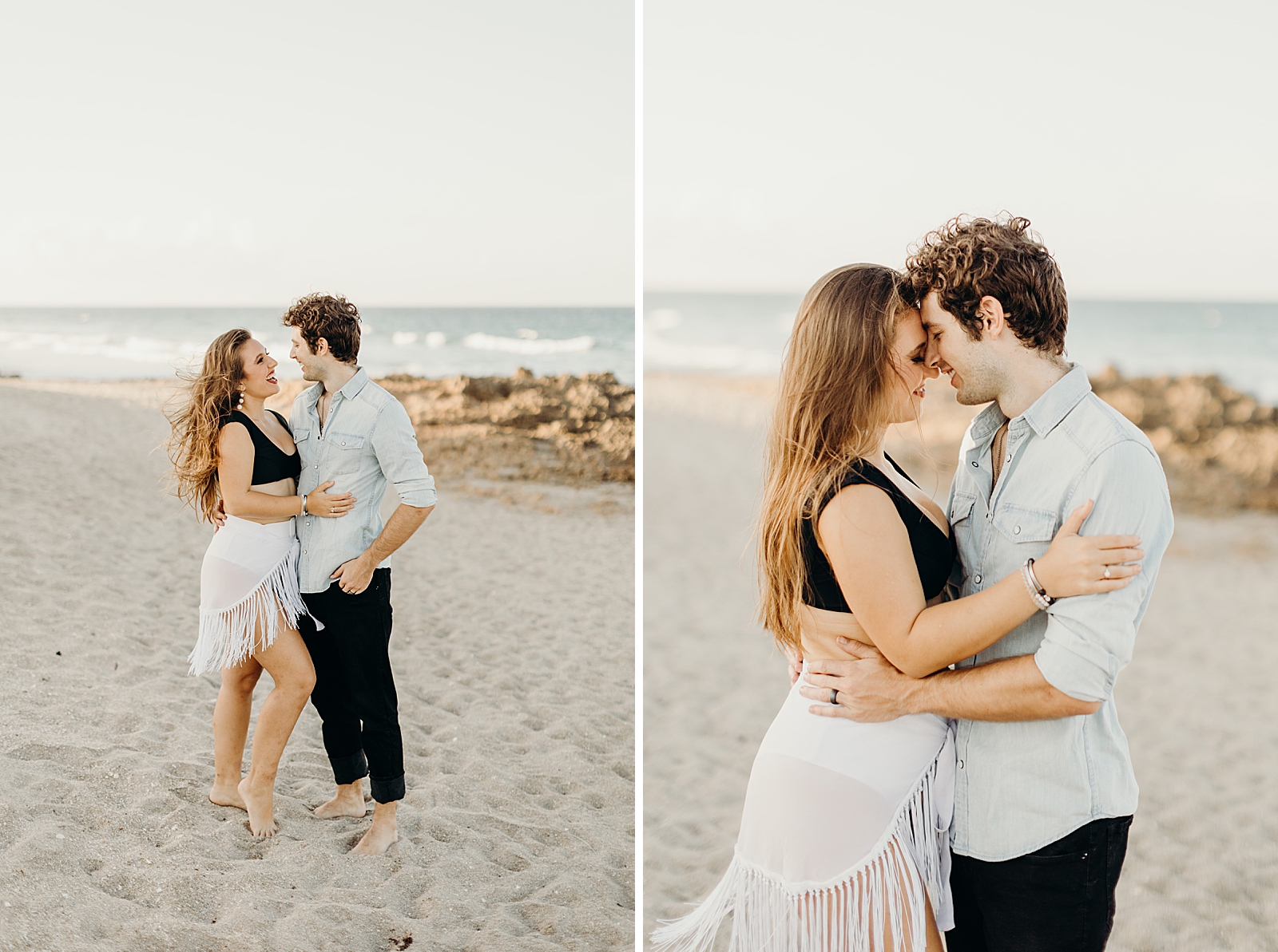 Couple holding each other barefoot on the beach and smiling at each other